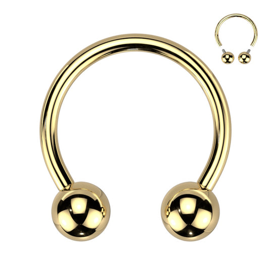 A titanium gold plated septum ring featuring a horseshoe shaped design thats internally threaded pictured against a white background.