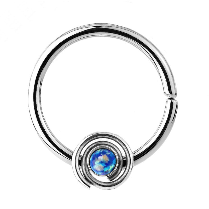 A bendable blue opal septum ring pictured against a white background.