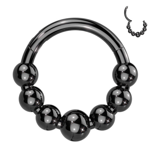 A black bead septum ring crafted from titanium featuring 7 beads around the bottom half of the piece pictured against a white background.