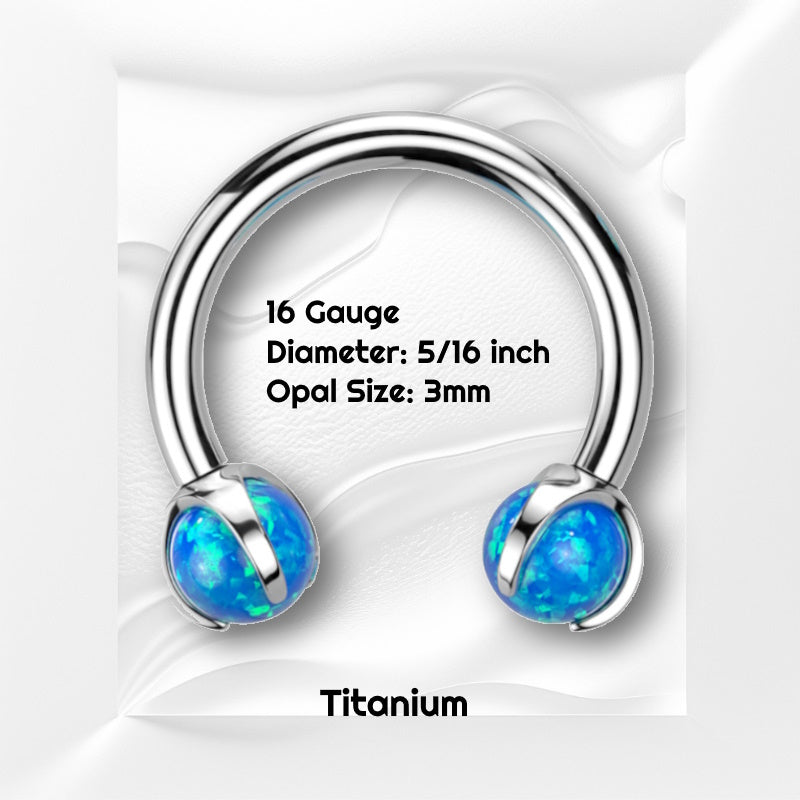 A blue opal septum ring pictured on a white wavy background with black text stating the size of the jewelry.