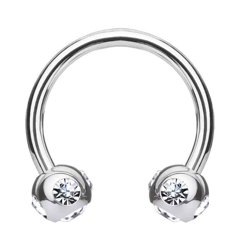 A clear gem septum ring featuring a horseshoe design that has a ball on each end with 5 clear gems in each pictured against a white background.