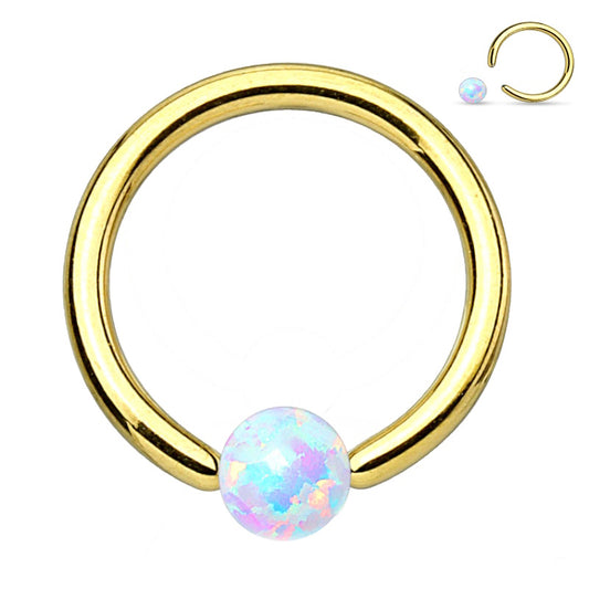 A gold plated opal captive septum ring with a gold plated hoop and an opal bead closure pictured against a white background.