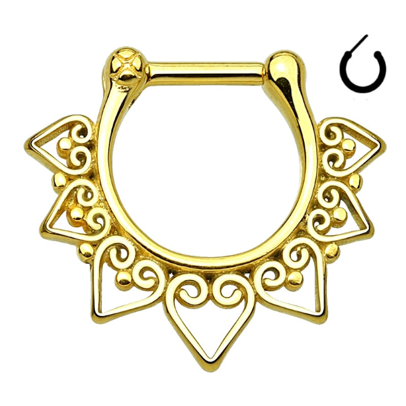 A gold plated tribal septum ring pictured against a white background.