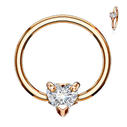 Heart CZ Captive Bead Septum Ring 16 Gauge 316L Surgical Steel in rose gold with a clear cubic zirconia pictured against a white background.