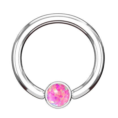 Opal Captive Septum Ring 16 Gauge 316L Surgical Steel 3mm Synthetic Opal in pink pictured against a white background.