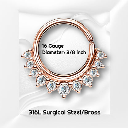 A rose gold crystal septum ring pictured on a white wavy background with black text stating the size of this piece of septum jewelry.