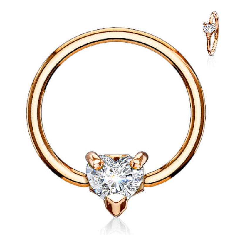 A rose gold CZ heart septum ring featuring a multi-directional heart captive pictured against a white background.