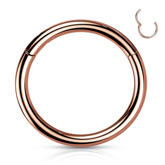 A rose gold septum hoop featuring a hinged segment pictured against a white background.