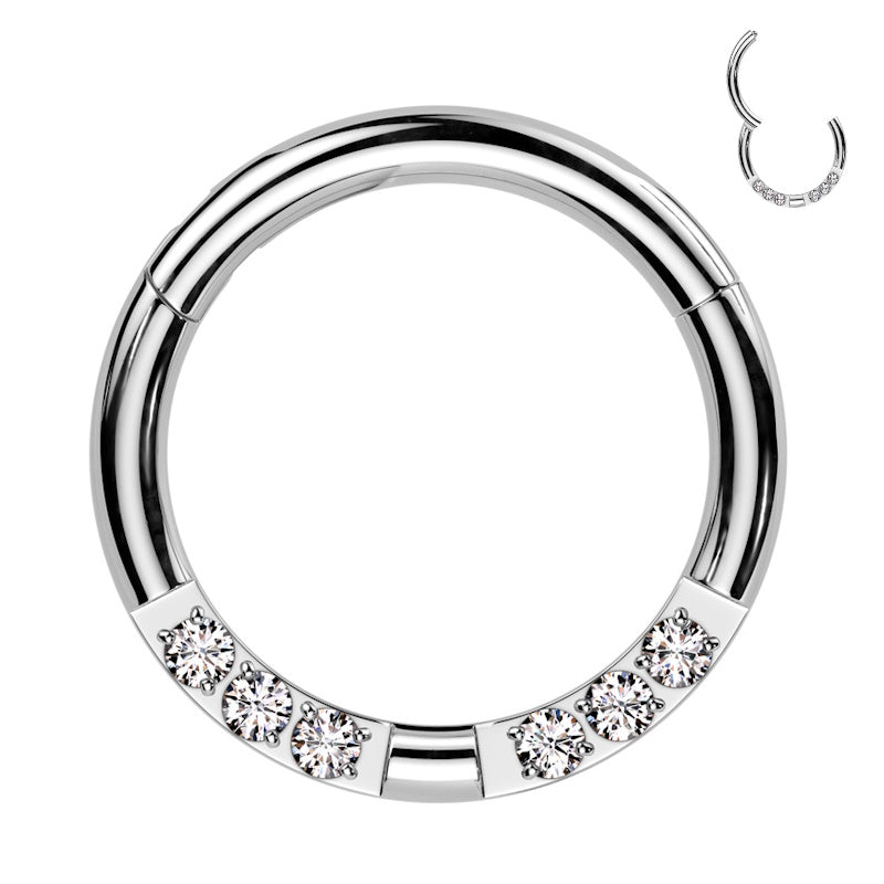 A surgical steel 16g segment ring with 6 cubic zirconia pictured against a white background.