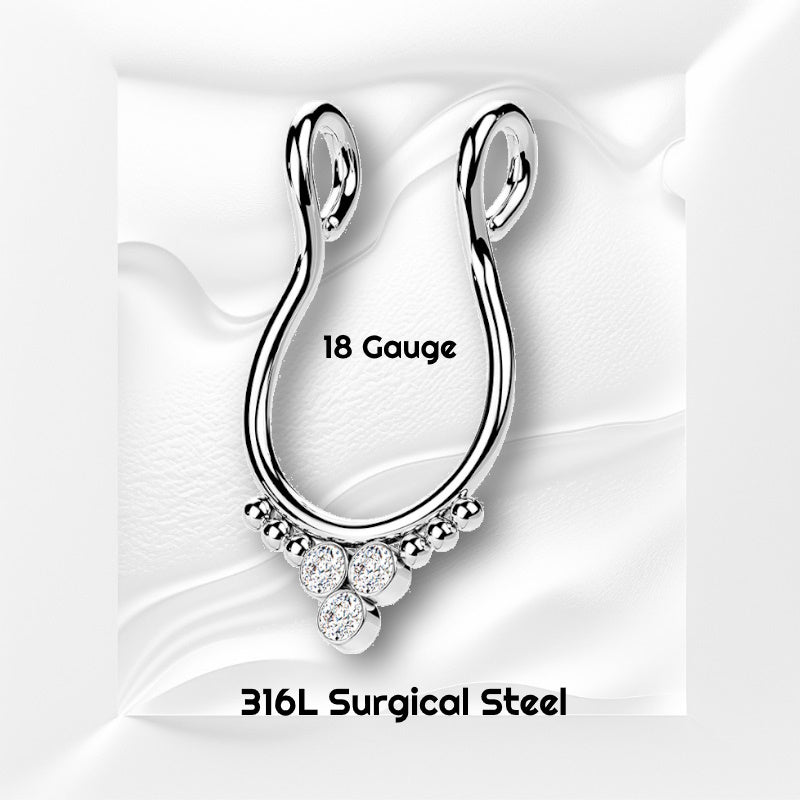 A surgical steel faux septum ring pictured on a white wavy background with black text stating the size of this piece of septum jewelry.