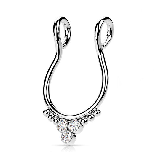 A surgical steel faux septum ring crafted from surgical steel with 6 beads and 3 flat cubic zirconia pictured against a white background.