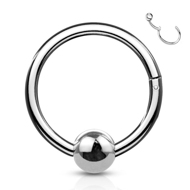 A surgical steel hinged septum ring that features a fixed bead pictured against a white background.