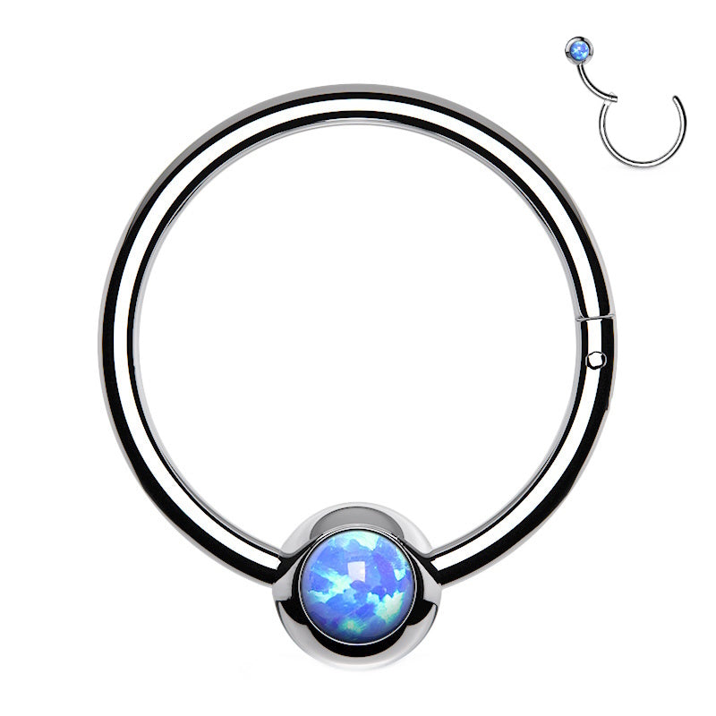 A surgical steel opal septum ring featuring an opal in the ball that's attached to a hinged segment of a hoop pictured against a white background.