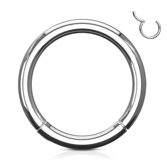 A surgical steel segment ring with a hinged segment for easy open and close pictured against a white background.