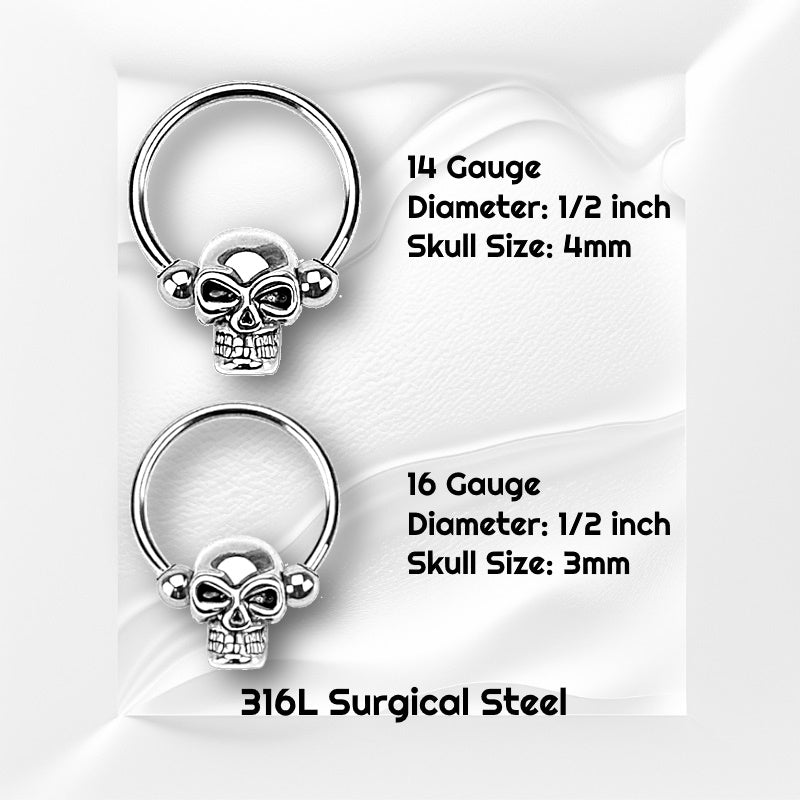 Two surgical steel skull septum rings pictured on a white wavy background with black text stating the size of each piece of the skull septum jewelry.