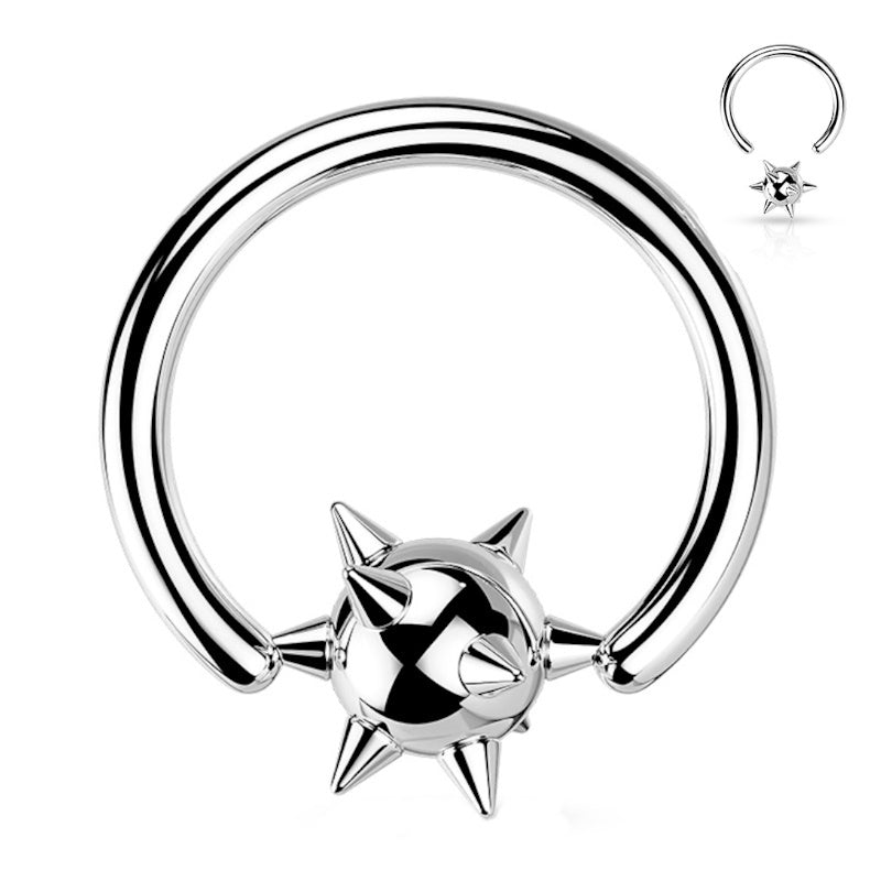 A surgical steel spiky septum ring featuring a captive ball covered in spikes and a surgical steel hoop pictured against a white background.