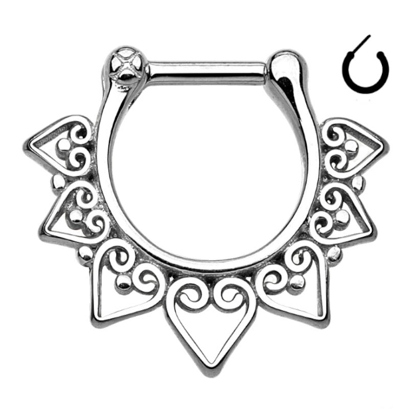 A surgical steel tribal septum ring with a unique design around the bottom half and a clicker style closure pictured against a white background.