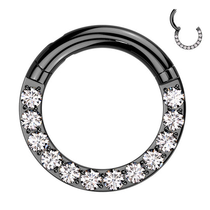 A titanium 12g segment ring featuring a black finish with cubic zirconia around the bottom half of the hoop pictured against a white background.
