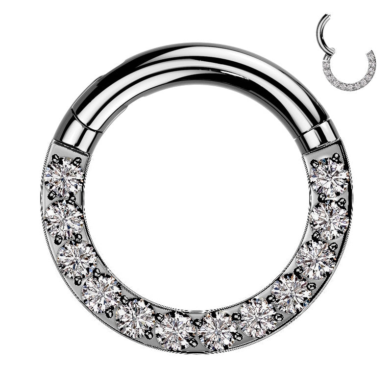 A titanium 4 gauge septum ring featuring shiny cubic zirconia's around the bottom of the hoop pictured against a white background.