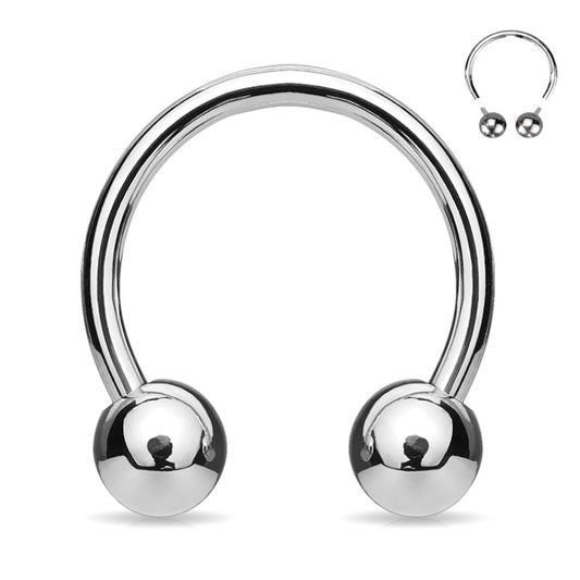 A titanium horseshoe septum ring with a secure ball on each end of the horseshoe pictured against a white background.