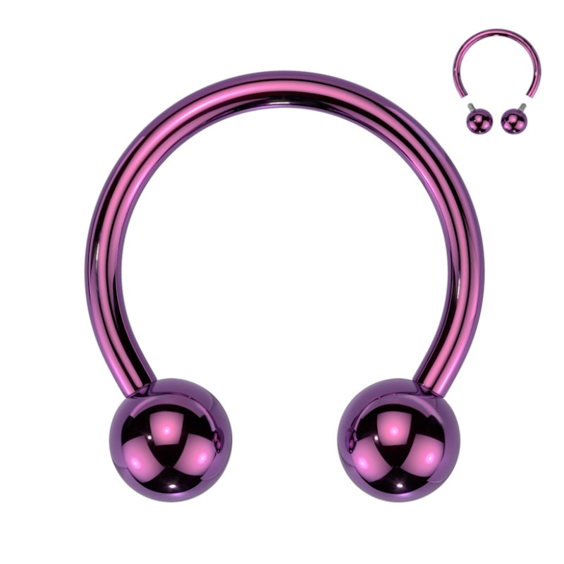 A titanium purple septum ring with a horseshoe barbell design that has a ball on each end pictured against a white background. 