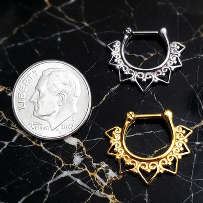 Tribal Septum Clicker Ring 16 Gauge 316L Surgical Steel Silver Gold pictured next to a dime on a black marble countertop showing size comparison.