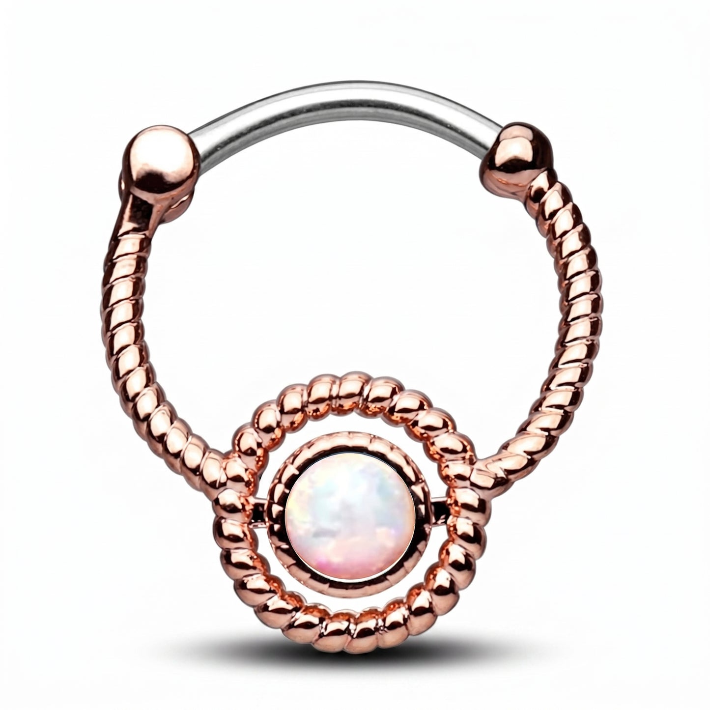 A twisted rope rose gold opal septum clicker pictured against a white background.