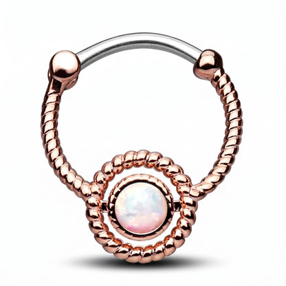 A twisted rope rose gold opal septum clicker pictured against a white background.