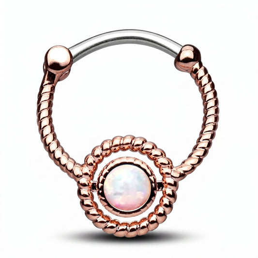 A twisted rope rose gold opal septum clicker pictured against a white background.